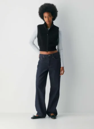 chaleco sin mangas con cuello alto Polartec® Thermal Pro™.