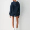 Cozy Sweatfleece de Aritzia. Mini shorts perfectos de talle alto Cozy Sweatfleece de Aritzia. Mini shorts perfectos de talle alto