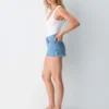 Denim Forum Jodie Mini short vaquero de talle alto y corte curvilíneo Denim Forum Jodie Mini short vaquero de talle alto y corte curvilíneo