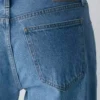 Denim Forum Los vaqueros vintage de talle bajo con vuelta de los años 90 Denim Forum Los vaqueros vintage de talle bajo con vuelta de los años 90
