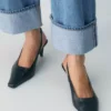 Denim Forum Los vaqueros vintage de talle bajo con vuelta de los años 90 Denim Forum Los vaqueros vintage de talle bajo con vuelta de los años 90