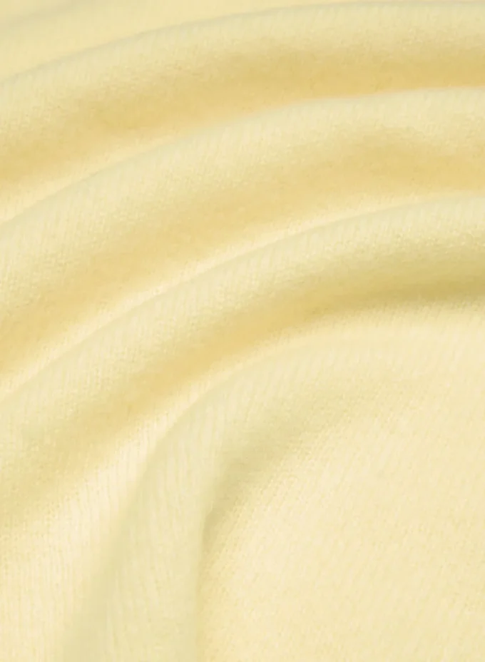 Feather Cashmere de Aritzia, 100 % ligero como una pluma. Jersey de manga corta holgado