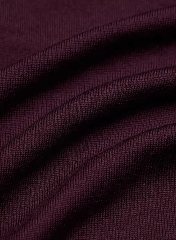 Jersey de cuello en V profundo de lana merino fina