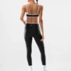 Leggings GloTone™ Showup de talle alto y 66 cm de largo