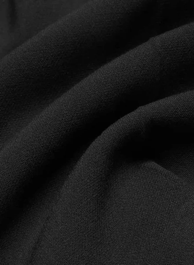 Pantalones cortos plisados hasta la mitad del muslo Pantalones cortos plisados hasta la mitad del muslo